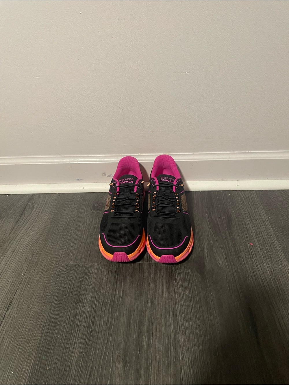 Skechers Women's Black Athletic Shoes with Pink and Orange Accents